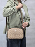 کیف پاسپورتی بزرگ زنانه Coach New York مدل دو زیپ جادار | کیف دوشی شیک و کاربردی