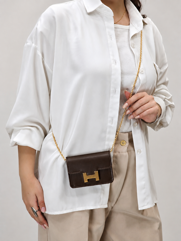 کیف مینی بگ زنانه هرمس (Hermès) مدل مجلسی با قفل H و بند زنجیری